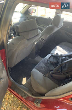 Хетчбек Mazda 323 1999 в 
