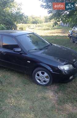 Хэтчбек Mazda 323 2000 в 