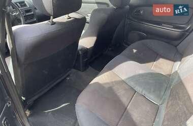 Хэтчбек Mazda 323 1997 в 