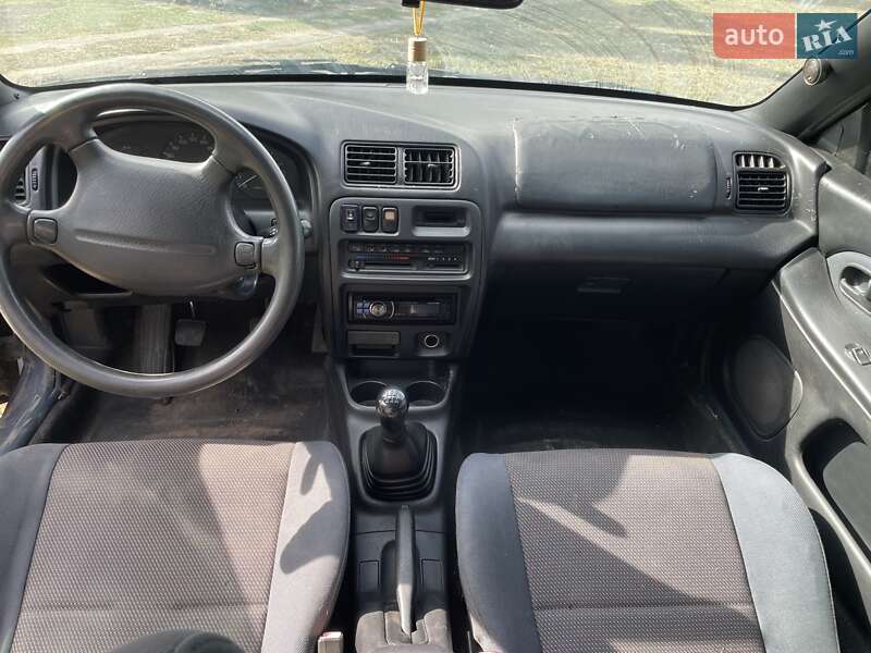 Хетчбек Mazda 323 1997 в Корсунь-Шевченківському фото 5 Хетчбек Mazda 323 1997 в Корсунь-Шевченківському
