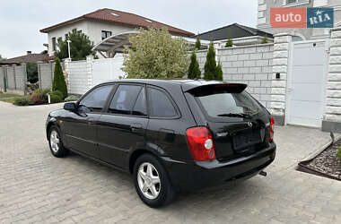 Хэтчбек Mazda 323 2003 в 