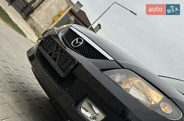 Хэтчбек Mazda 323 2003 в 