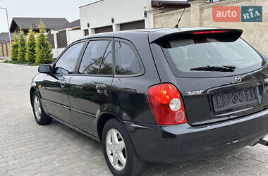 Хэтчбек Mazda 323 2003 в 