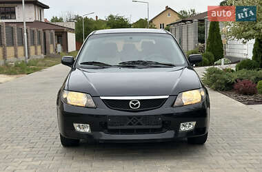 Хэтчбек Mazda 323 2003 в 