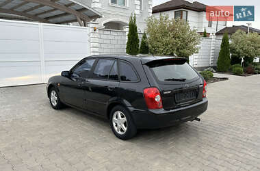 Хэтчбек Mazda 323 2003 в 