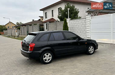 Хэтчбек Mazda 323 2003 в 