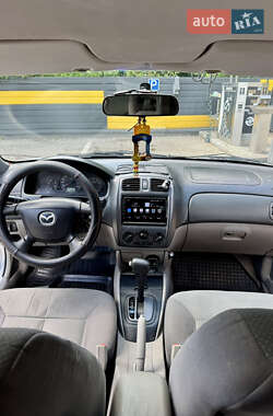 Хэтчбек Mazda 323 2002 в 