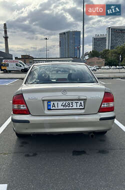 Седан Mazda 323 1999 в 