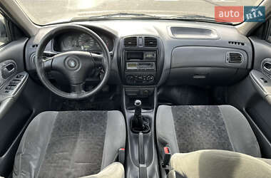 Седан Mazda 323 1999 в 