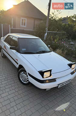 Хэтчбек Mazda 323 1990 в 