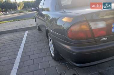 Седан Mazda 323 1998 в 