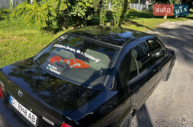 Седан Mazda 323 1999 в 