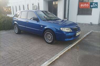 Хэтчбек Mazda 323 2003 в 