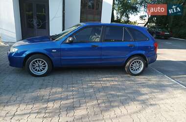 Хэтчбек Mazda 323 2003 в 