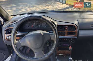 Хэтчбек Mazda 323 1996 в 