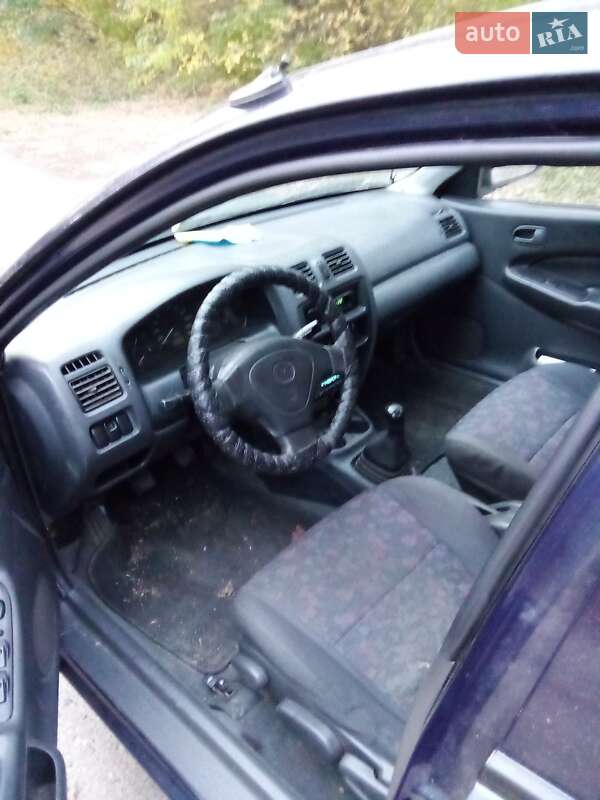 Седан Mazda 323 1997 в Переяславе