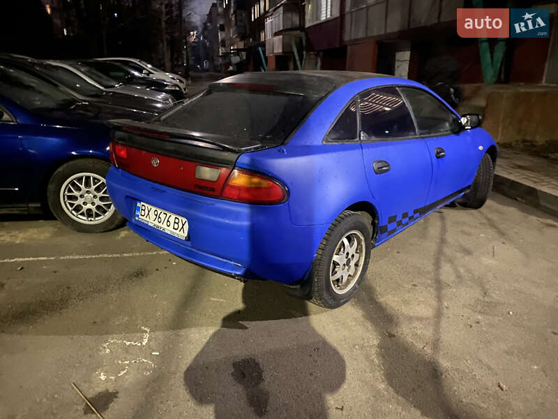 Хетчбек Mazda 323 1997 в Хмельницькому фото 8 Хетчбек Mazda 323 1997 в Хмельницькому