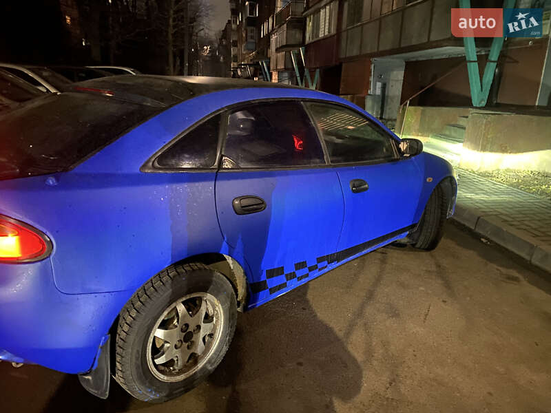 Хетчбек Mazda 323 1997 в Хмельницькому фото 13 Хетчбек Mazda 323 1997 в Хмельницькому