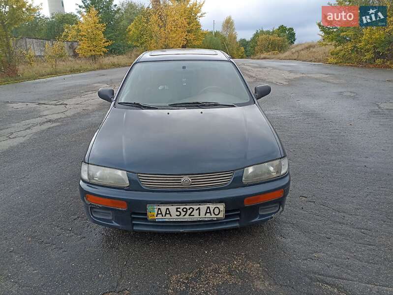 Седан Mazda 323 1995 в Богуславе фото Седан Mazda 323 1995 в Богуславе