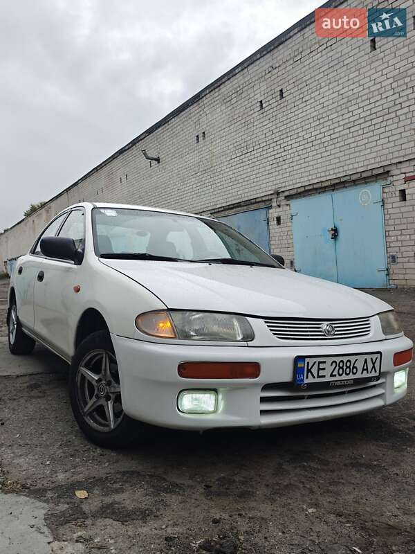 Седан Mazda 323 1996 в Днепре фото Седан Mazda 323 1996 в Днепре