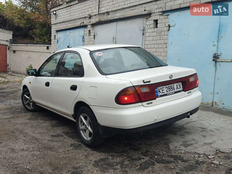 Седан Mazda 323 1996 в Днепре фото 5 Седан Mazda 323 1996 в Днепре