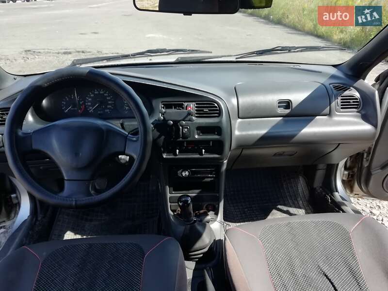 Седан Mazda 323 1996 в Ровно фото 4 Седан Mazda 323 1996 в Ровно