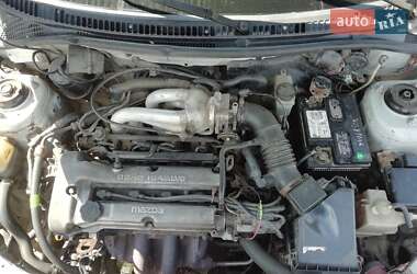 Седан Mazda 323 1996 в  фото 5 Седан Mazda 323 1996 в