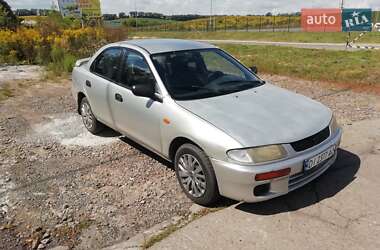 Седан Mazda 323 1996 в  фото 15 Седан Mazda 323 1996 в