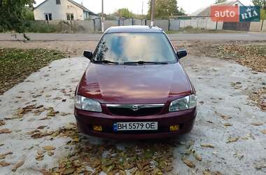 Седан Mazda 323 1999 в 