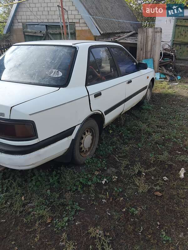 Седан Mazda 323 1991 в Солоному фото 8 Седан Mazda 323 1991 в Солоному