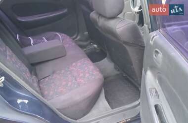 Седан Mazda 323 1998 в  фото 9 Седан Mazda 323 1998 в