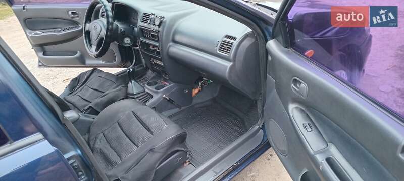 Седан Mazda 323 1998 в Дніпрі фото 11 Седан Mazda 323 1998 в Дніпрі