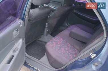 Седан Mazda 323 1998 в  фото 10 Седан Mazda 323 1998 в