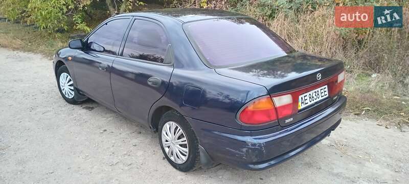 Седан Mazda 323 1998 в Дніпрі фото 3 Седан Mazda 323 1998 в Дніпрі