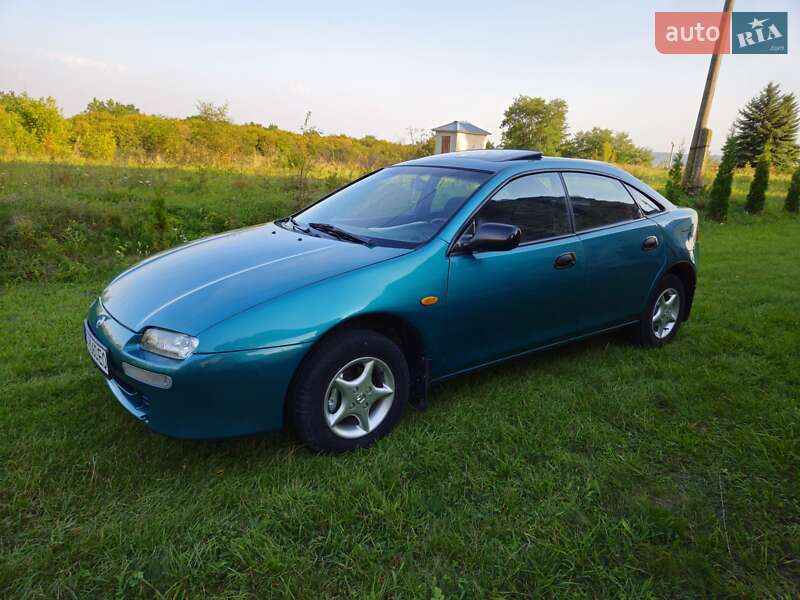Хэтчбек Mazda 323 1994 в Теребовле фото 4 Хэтчбек Mazda 323 1994 в Теребовле