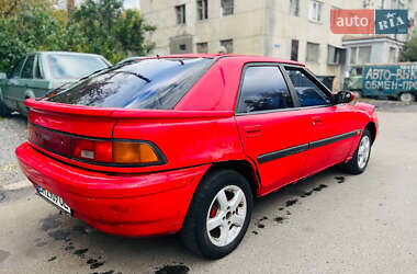 Хетчбек Mazda 323 1990 в  фото 2 Хетчбек Mazda 323 1990 в