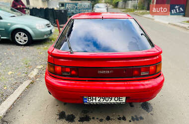 Хетчбек Mazda 323 1990 в  фото 7 Хетчбек Mazda 323 1990 в
