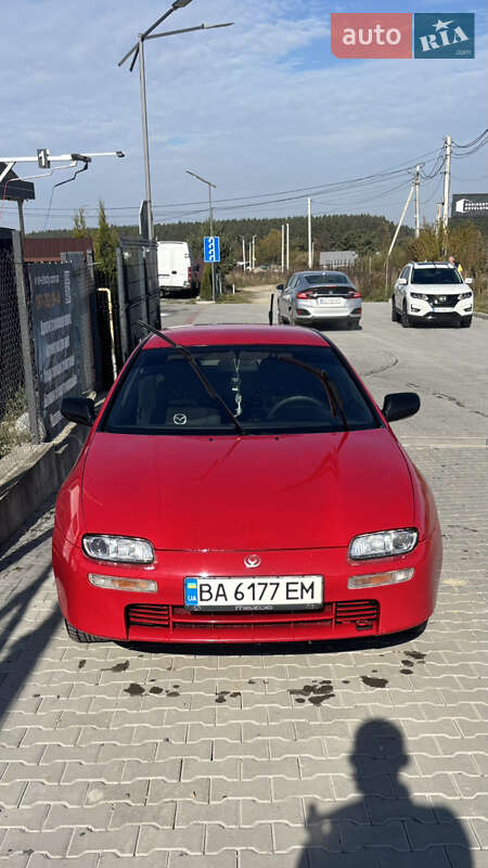 Хэтчбек Mazda 323 1995 в  фото Хэтчбек Mazda 323 1995 в