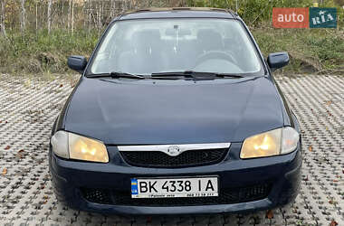 Седан Mazda 323 1999 в  фото 11 Седан Mazda 323 1999 в