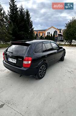 Хэтчбек Mazda 323 2001 в  фото 9 Хэтчбек Mazda 323 2001 в