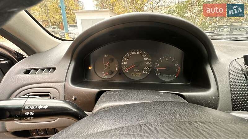 Хетчбек Mazda 323 1999 в Києві фото 15 Хетчбек Mazda 323 1999 в Києві