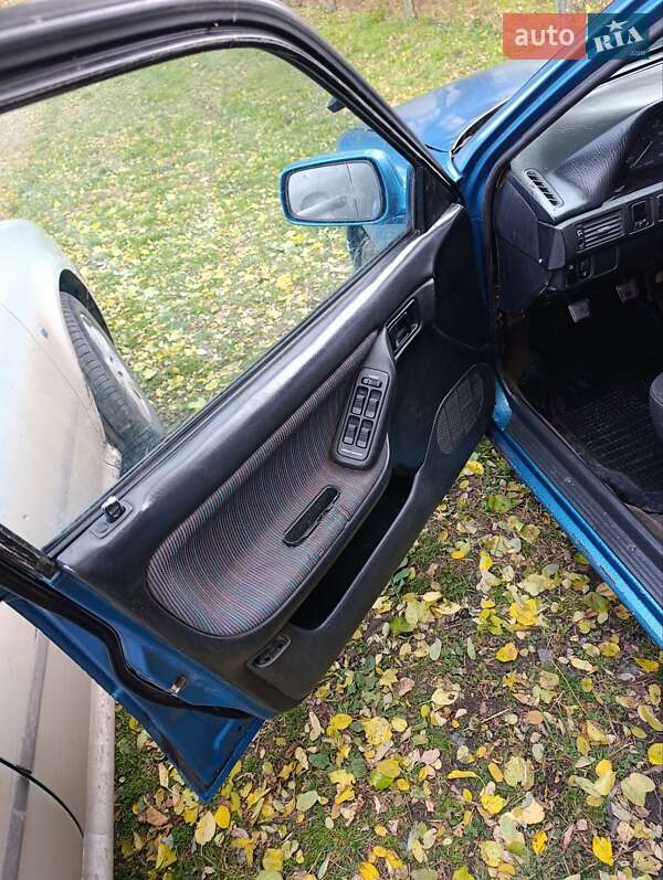 Седан Mazda 323 1995 в Сумах