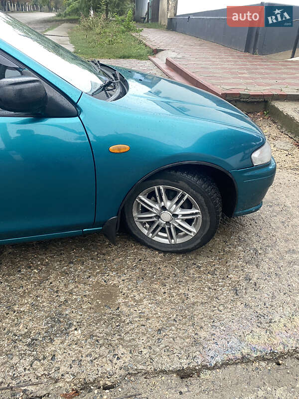Седан Mazda 323 1998 в Одесі фото 25 Седан Mazda 323 1998 в Одесі
