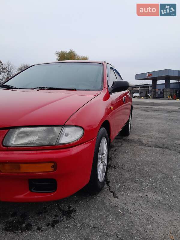 Седан Mazda 323 1996 в Синельниково фото 5 Седан Mazda 323 1996 в Синельниково