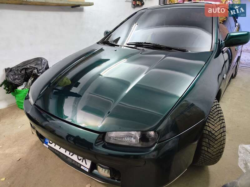 Хэтчбек Mazda 323 1994 в Николаеве фото 8 Хэтчбек Mazda 323 1994 в Николаеве