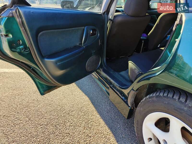 Хэтчбек Mazda 323 1994 в Николаеве фото 52 Хэтчбек Mazda 323 1994 в Николаеве