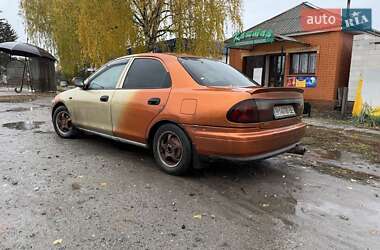 Седан Mazda 323 1997 в Сумах