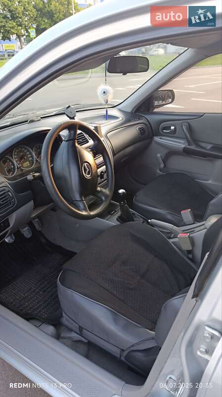 Хетчбек Mazda 323 2003 в Чернігові фото 5 Хетчбек Mazda 323 2003 в Чернігові