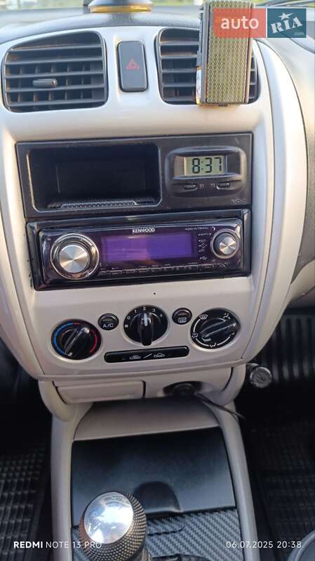 Хетчбек Mazda 323 2003 в Чернігові фото 14 Хетчбек Mazda 323 2003 в Чернігові