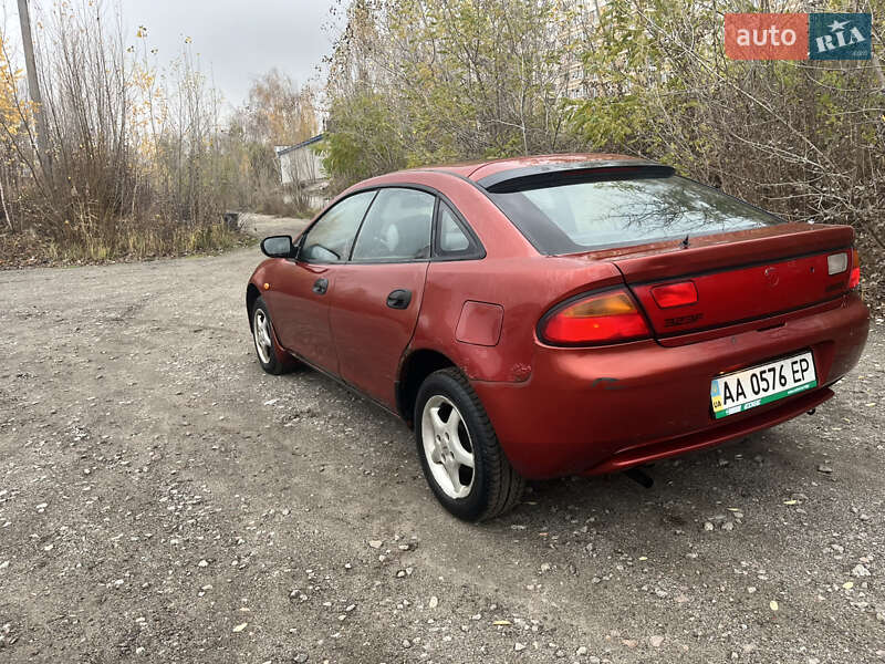 Хэтчбек Mazda 323 1994 в Вышгороде фото 7 Хэтчбек Mazda 323 1994 в Вышгороде